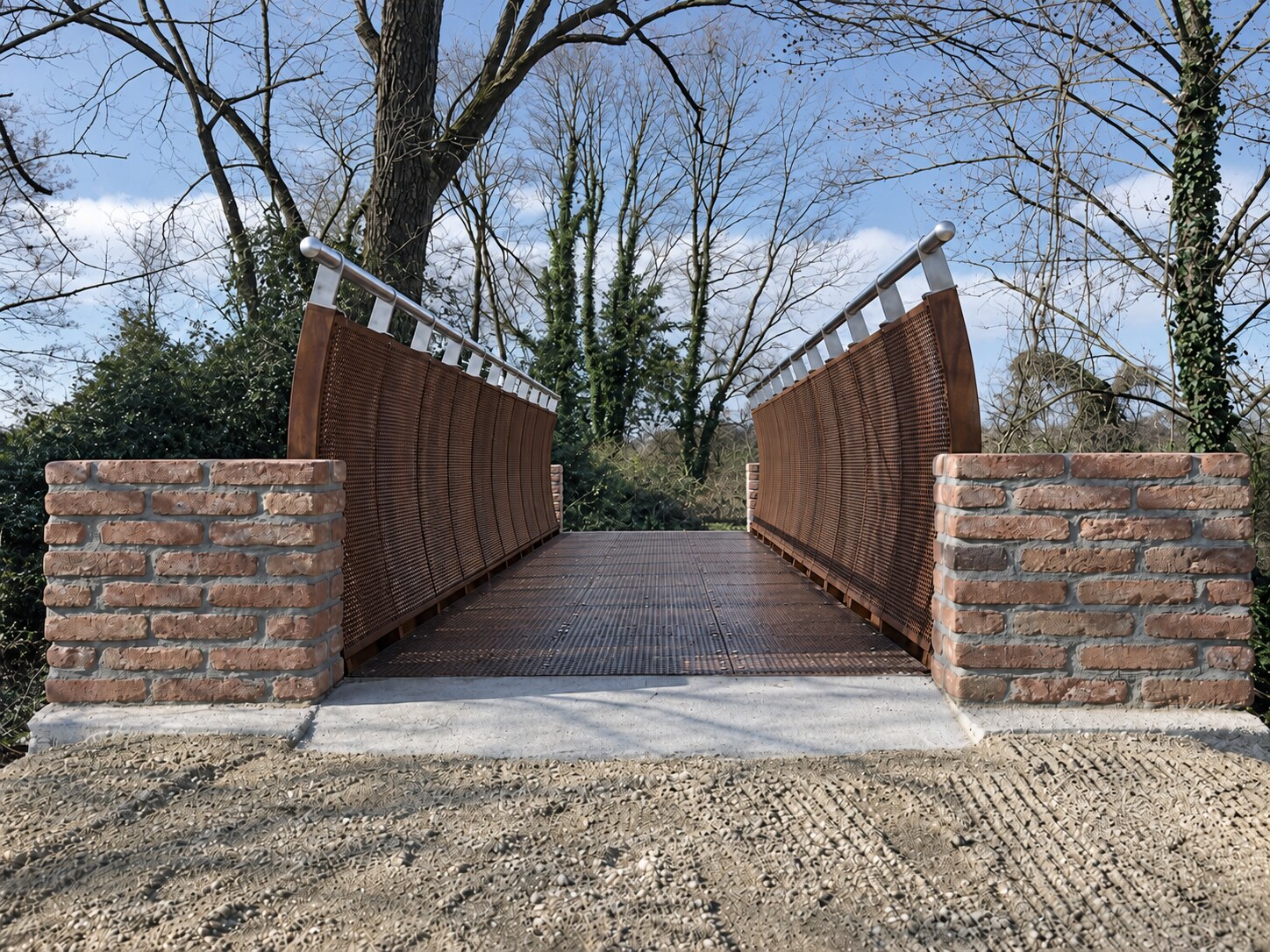 Ingresso e parapetti curvi in acciaio Corten di un ponte ciclopedonale a Buccinasco